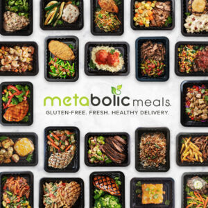 Many healthy meals in black meal prep trays surrounding the Metabolic Meals logo and tagline "Gluten free, fresh, healthy delivery."